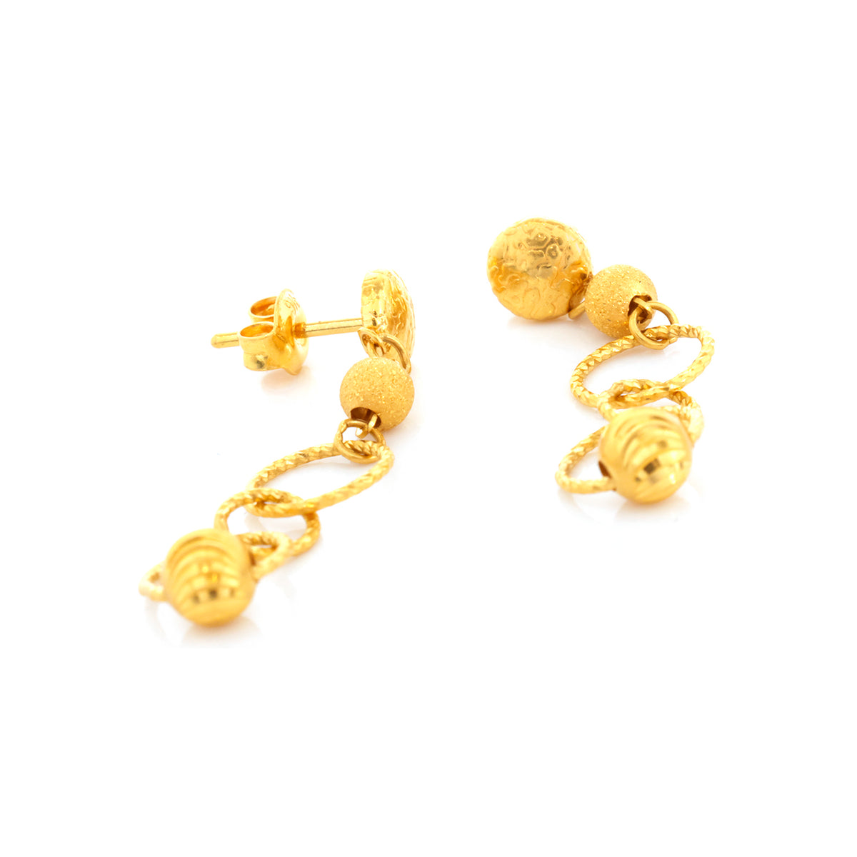 Gold earrings with chain and round beads on a white background