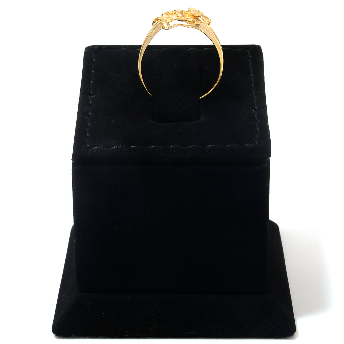 A yellow gold ring displayed on a black velvet ring box against a white background.