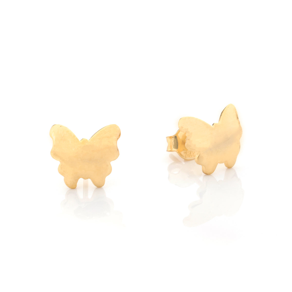 A pair of small butterfly-shaped stud earrings in yellow gold, shown on a clean white reflective surface.