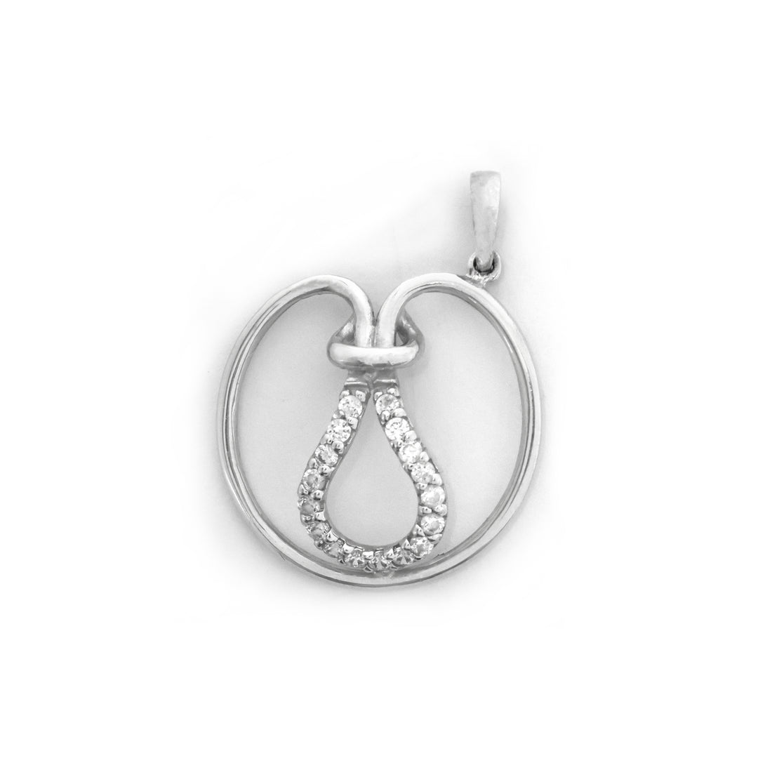 Silver pendant with a circular design and small stones on a white background