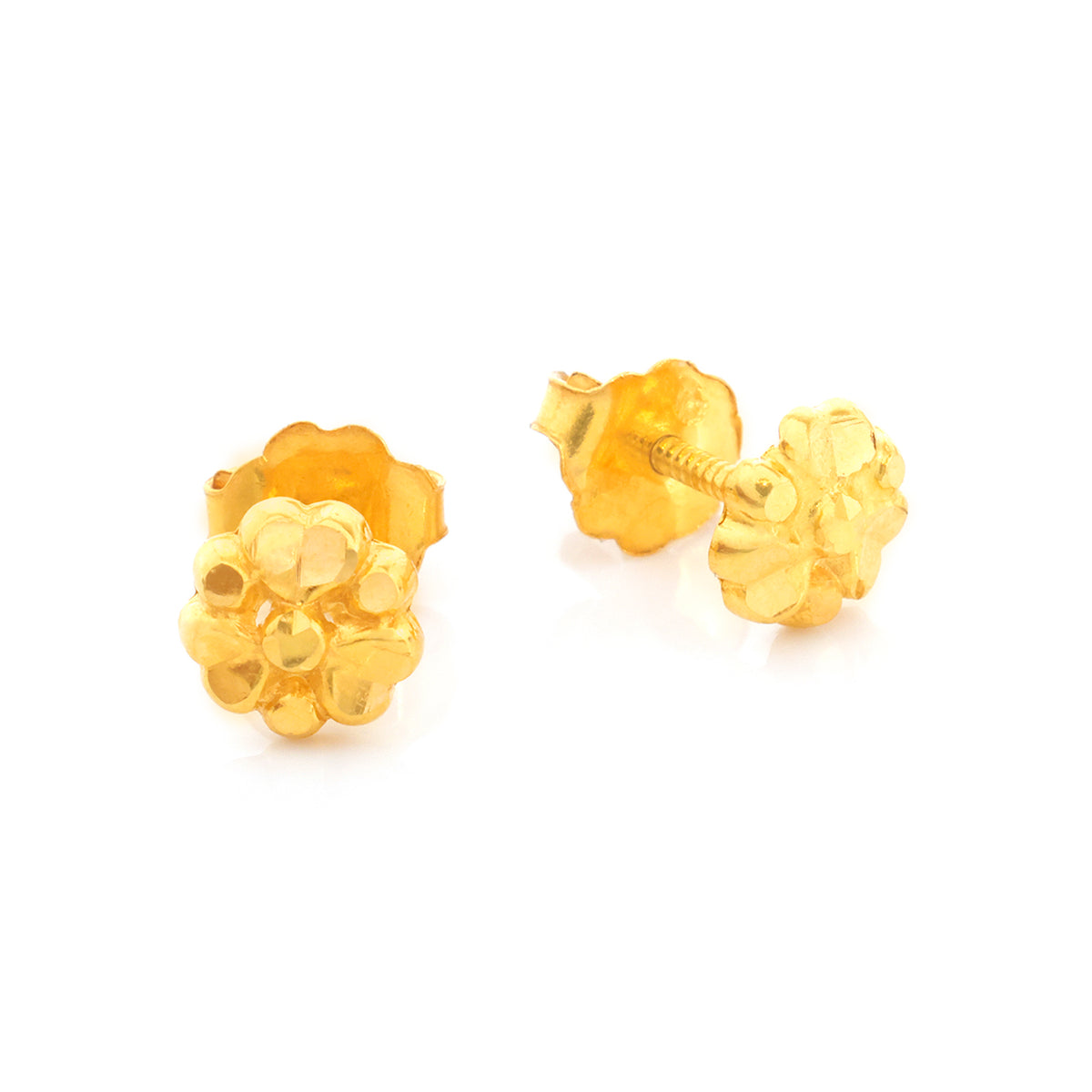 Pair of gold stud earrings on a white background
