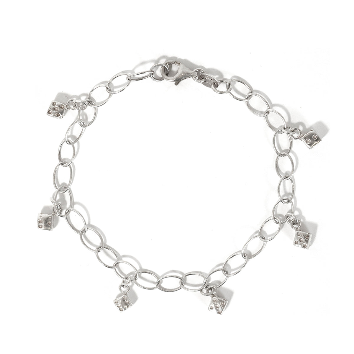 Silver chain bracelet with charms on a white background