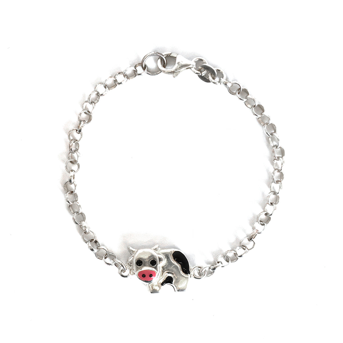 Silver bracelet with a cow charm on a white background