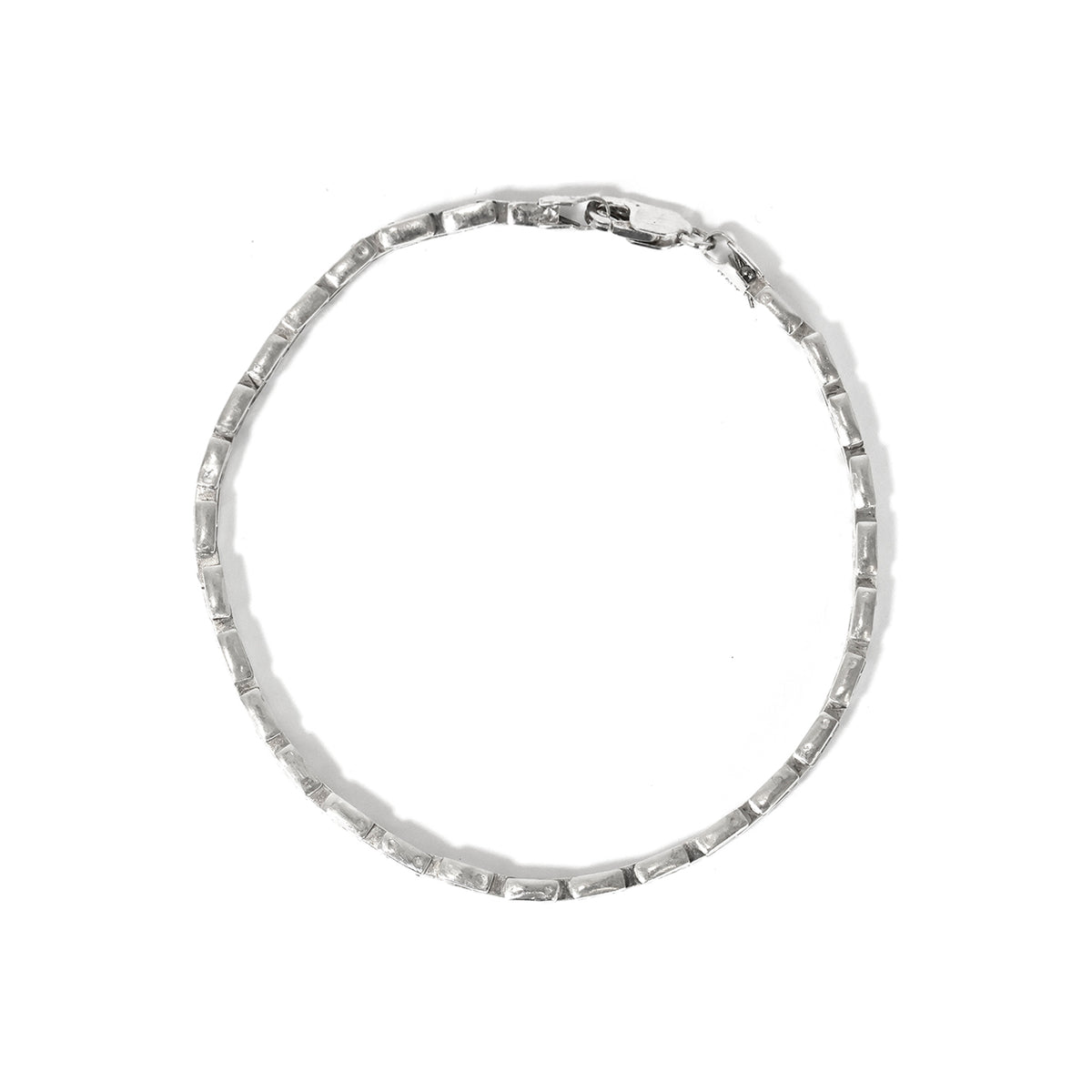Silver bracelet on a white background