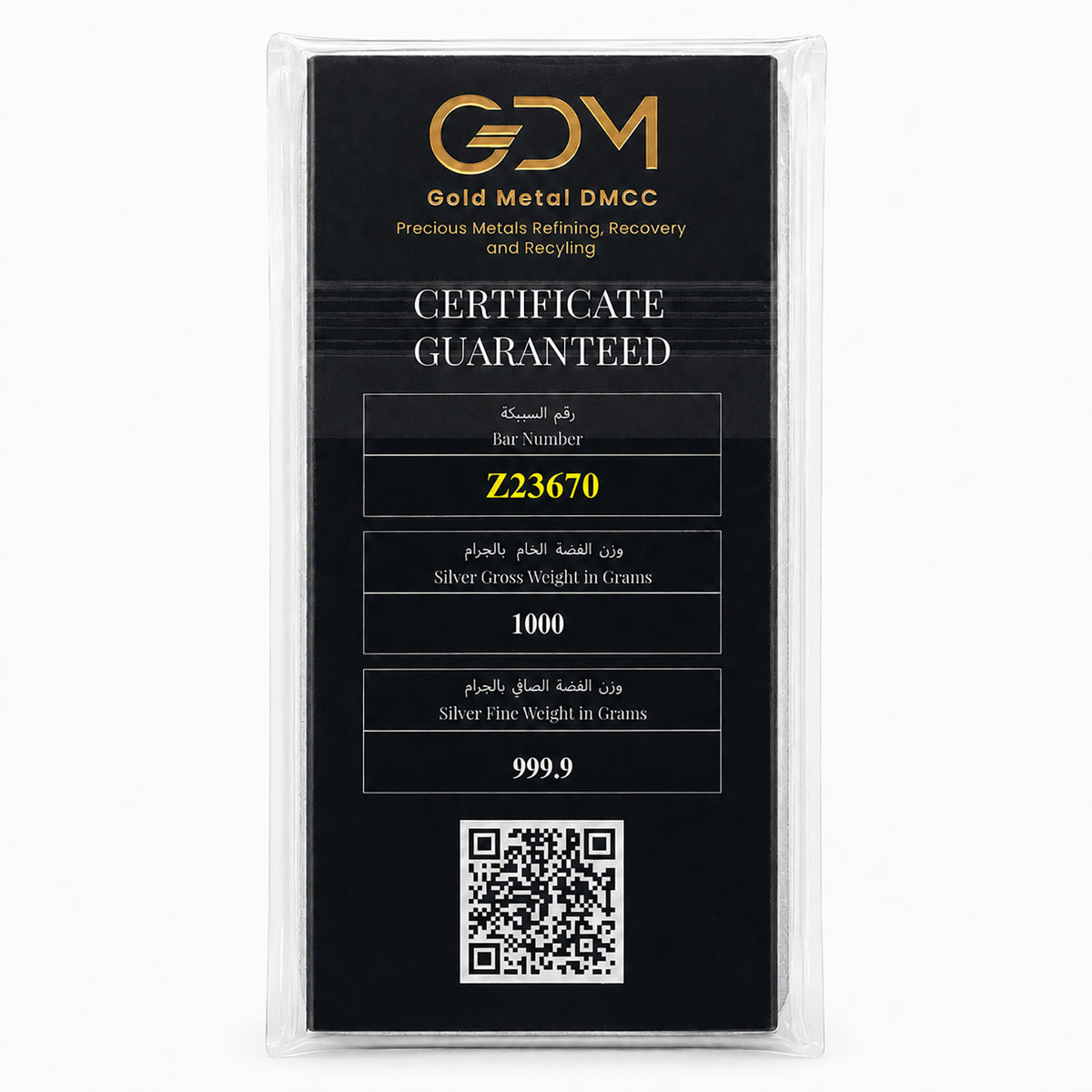 A silver 1000 gram bullion bar certificate guarantee card from Gold Metal DMCC, sealed inside a clear plastic protective sleeve. The card is black with gold and white text, featuring the brand logo 'GDM' at the top and a QR code at the bottom.