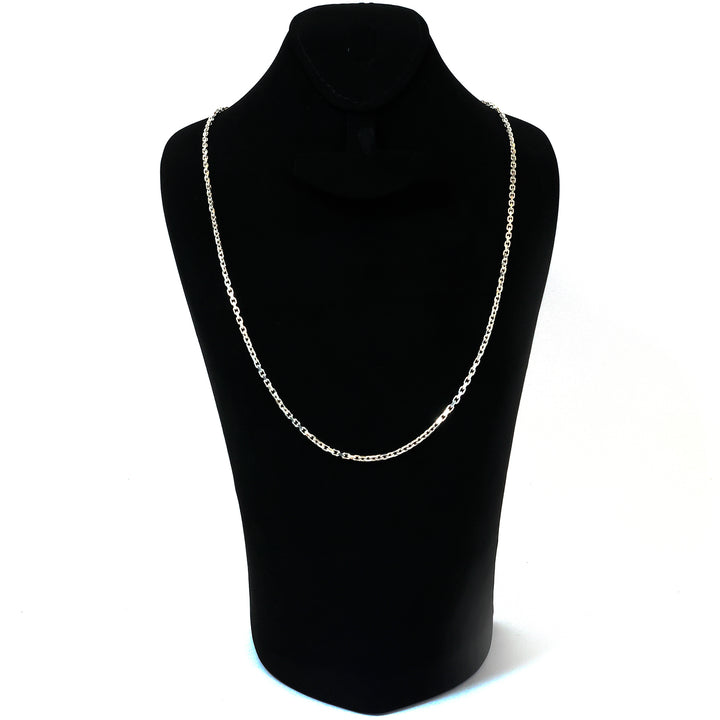 Silver chain necklace on a black mannequin bust against a white background