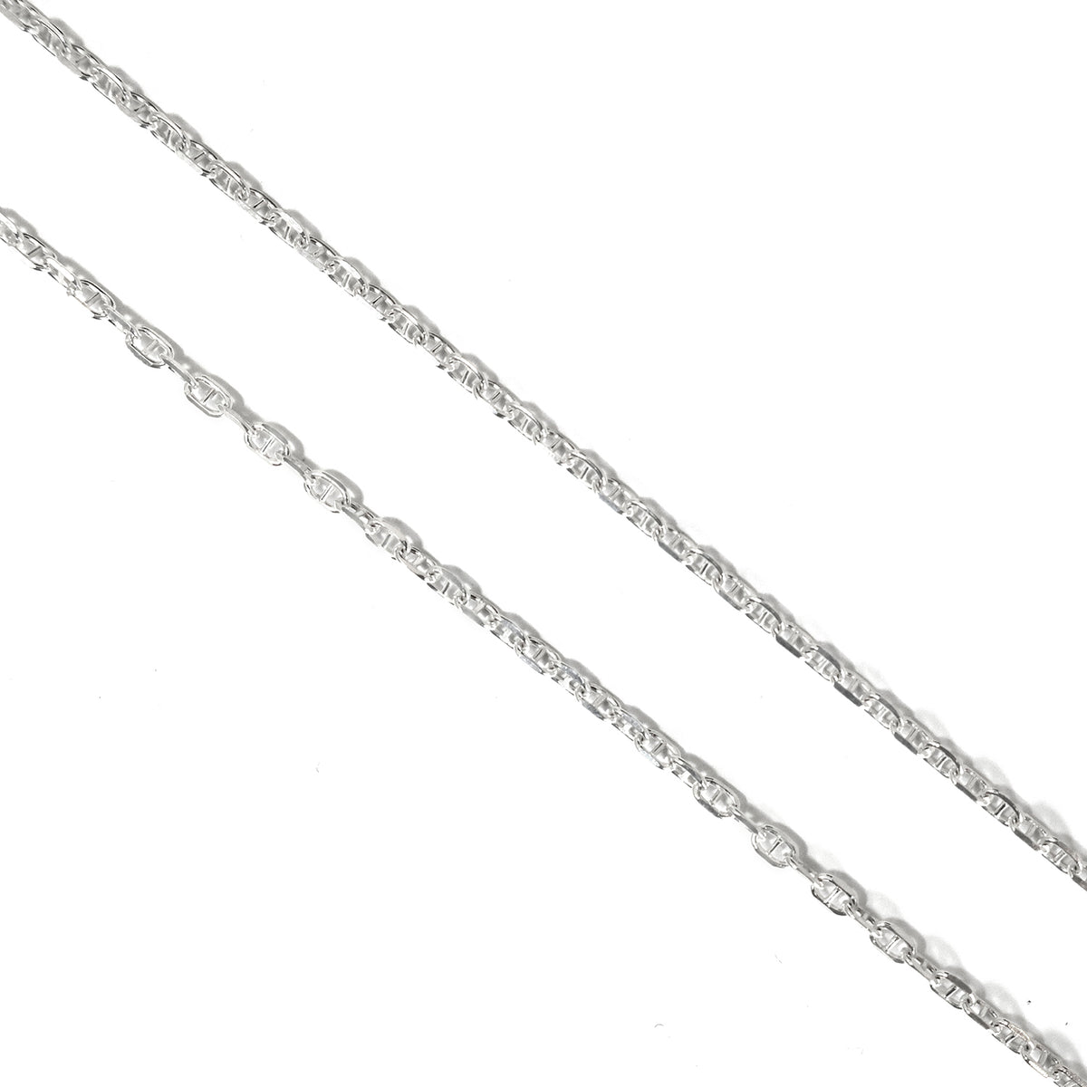 Silver chain necklace on a white background