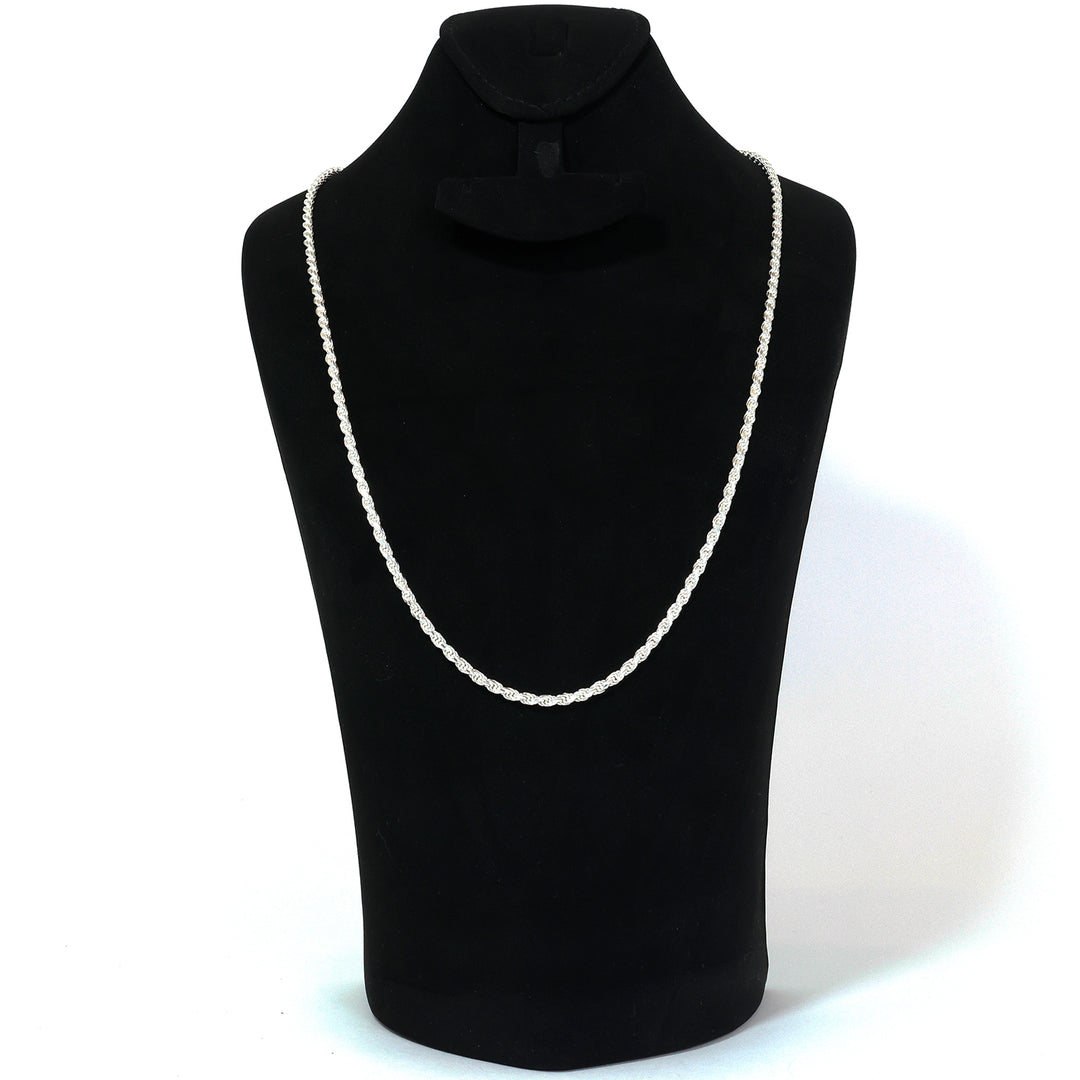 White rope necklace on a black mannequin bust against a white background