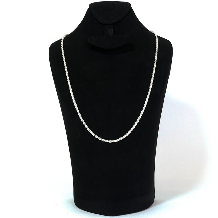 White rope necklace on a black mannequin bust against a white background
