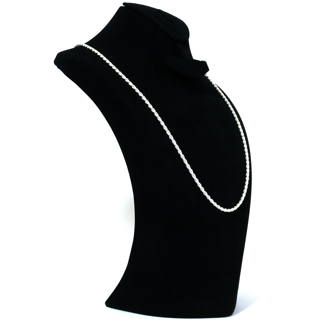 Black turtleneck sweater with white trim on a white background