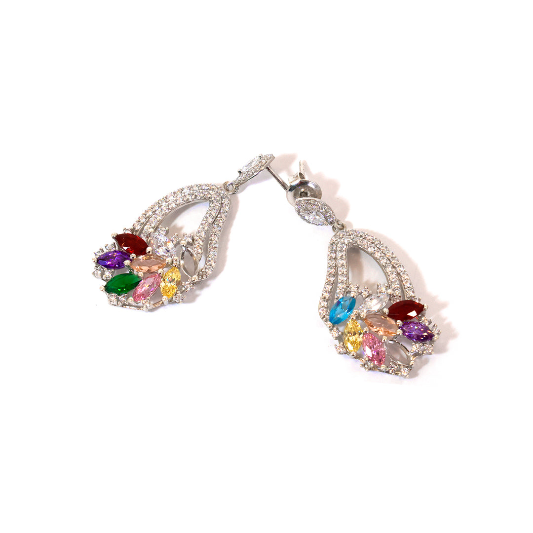 Pair of earrings with multicolored gemstones on a white background