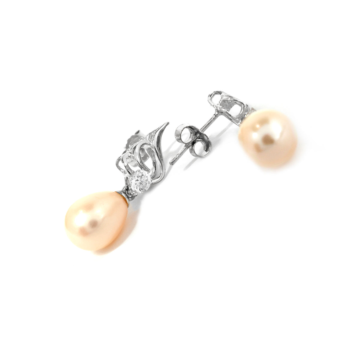 Pearl earring with silver crown-like design on a white background