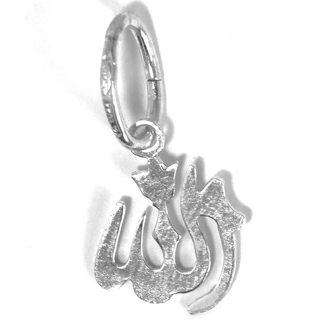 Silver pendant with Arabic calligraphy on a white background
