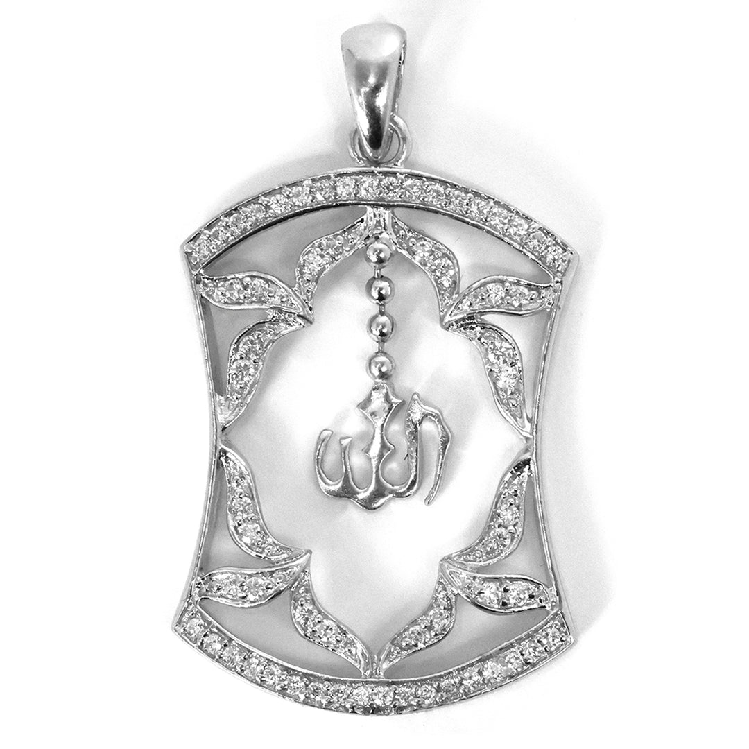 Silver pendant with intricate design and central emblem on a white background