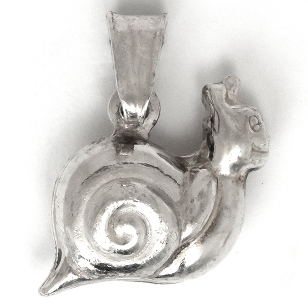 Silver snail pendant on a white background