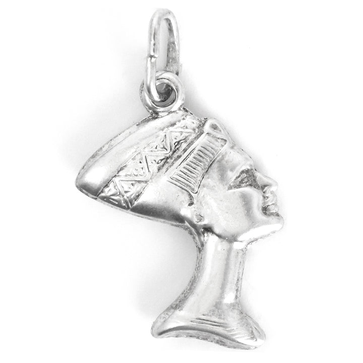 Silver pendant with a detailed design on a white background