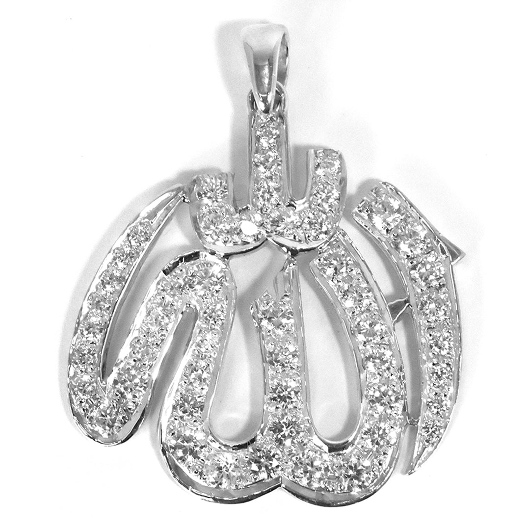 Silver pendant with intricate design on a white background
