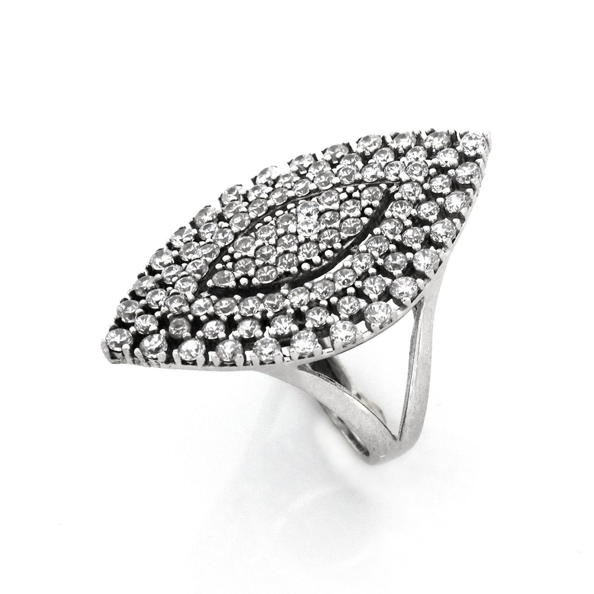 Silver ring with clear gemstones on a white background