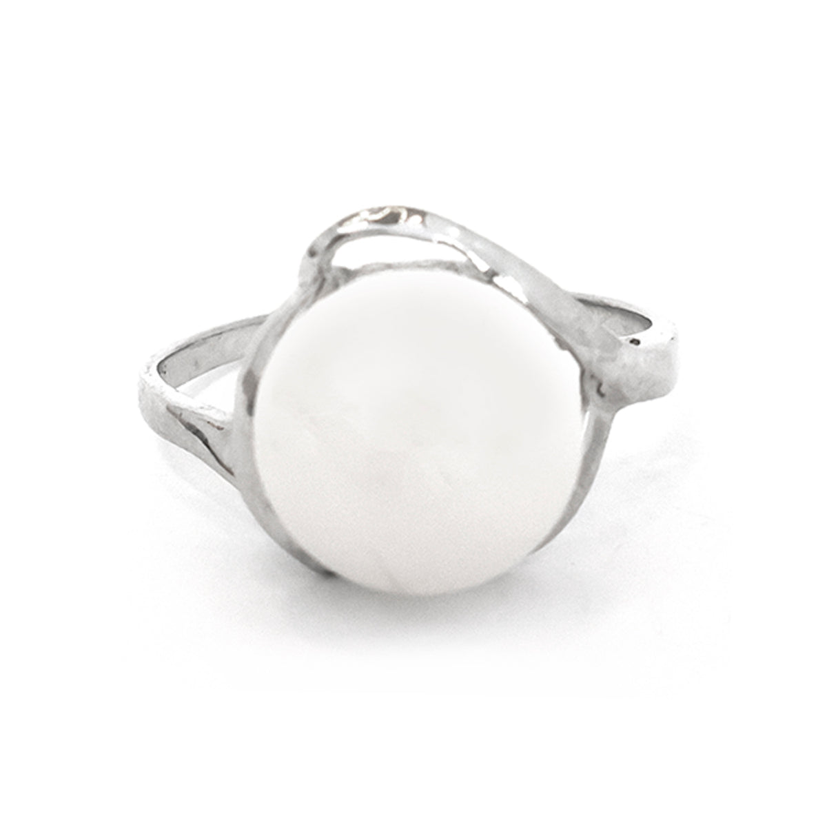 Silver ring with a white circular stone on a white background