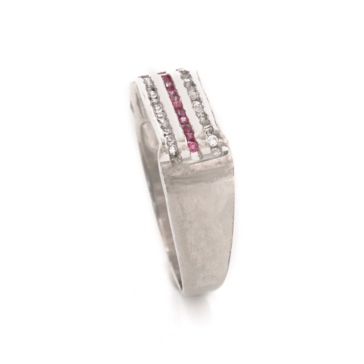 Silver ring with embedded gemstones on a white background