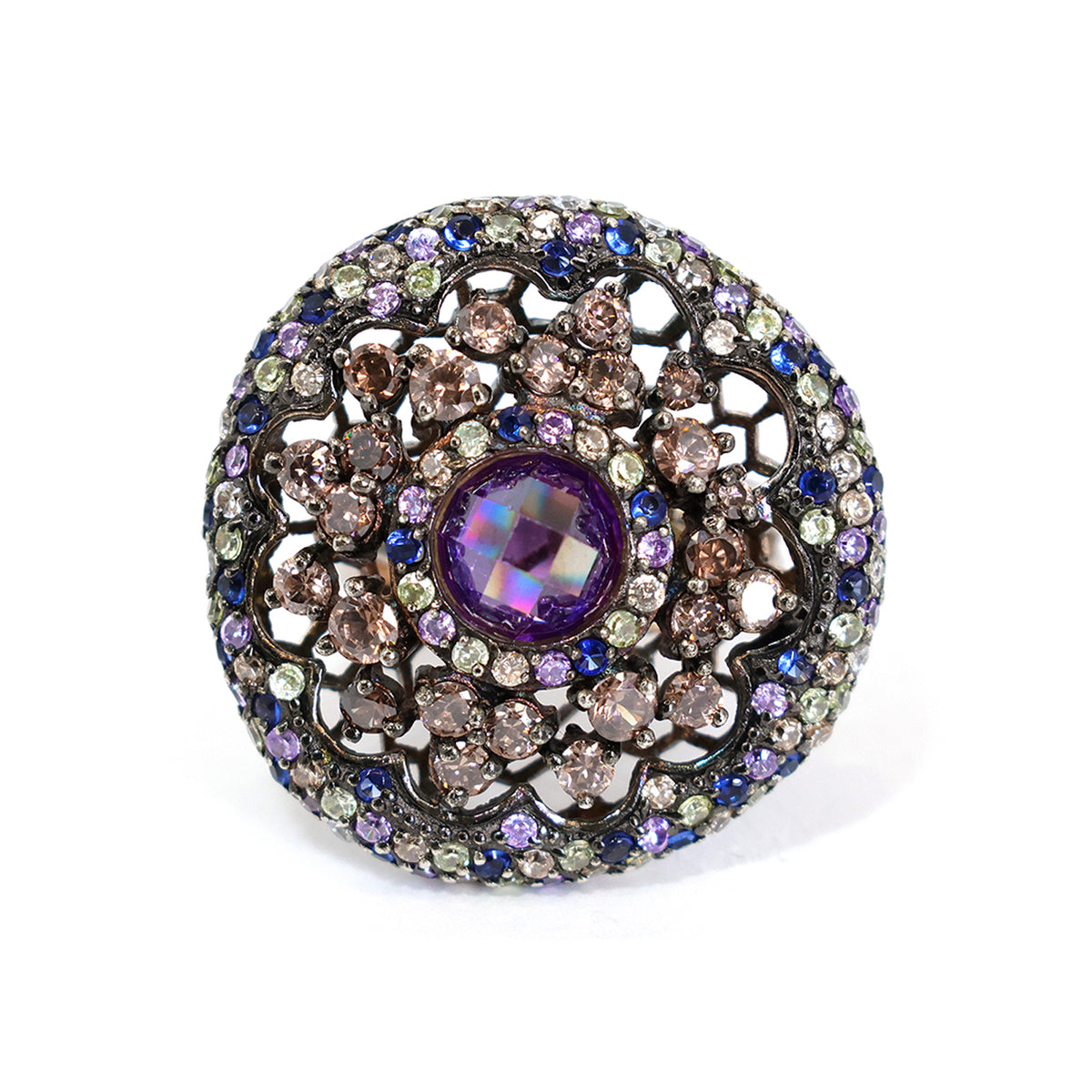 Decorative brooch with purple gemstone on a white background