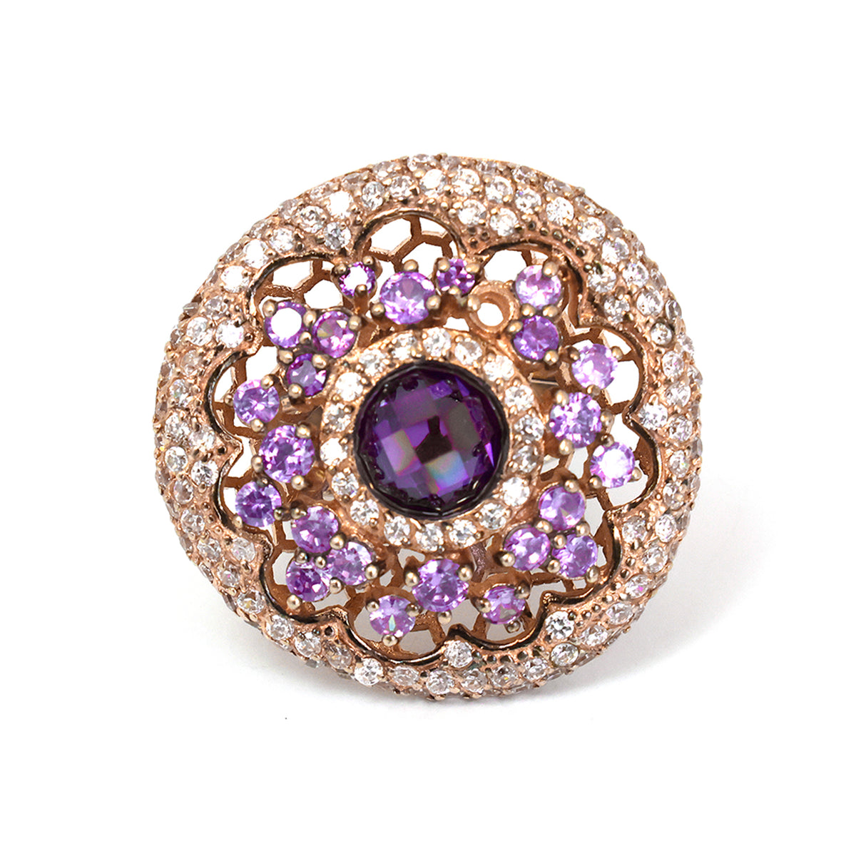 Jewelry item with purple gemstone and rose gold setting on a white background