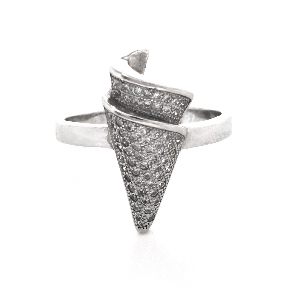 Silver ring with textured design on a white background