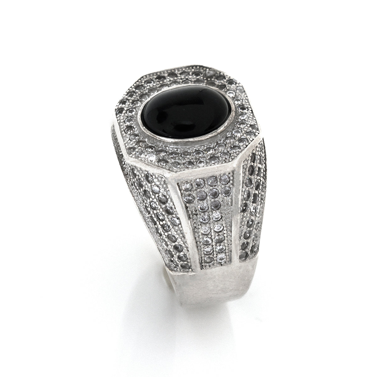 Silver ring with black gemstone on a white background