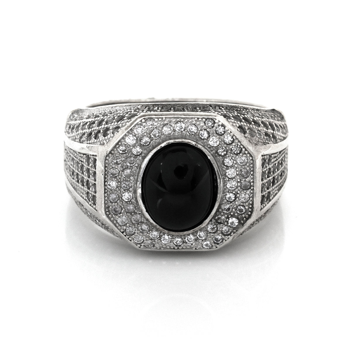 Silver ring with a black center stone on a white background