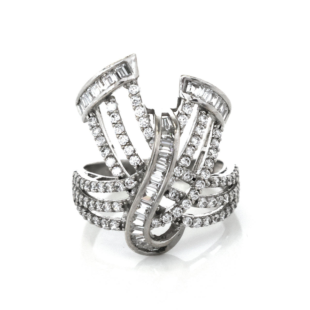 Silver ring with diamond accents on a white background