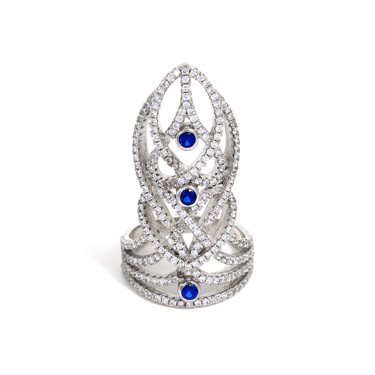 Elegant silver ring with blue gemstones on a white background