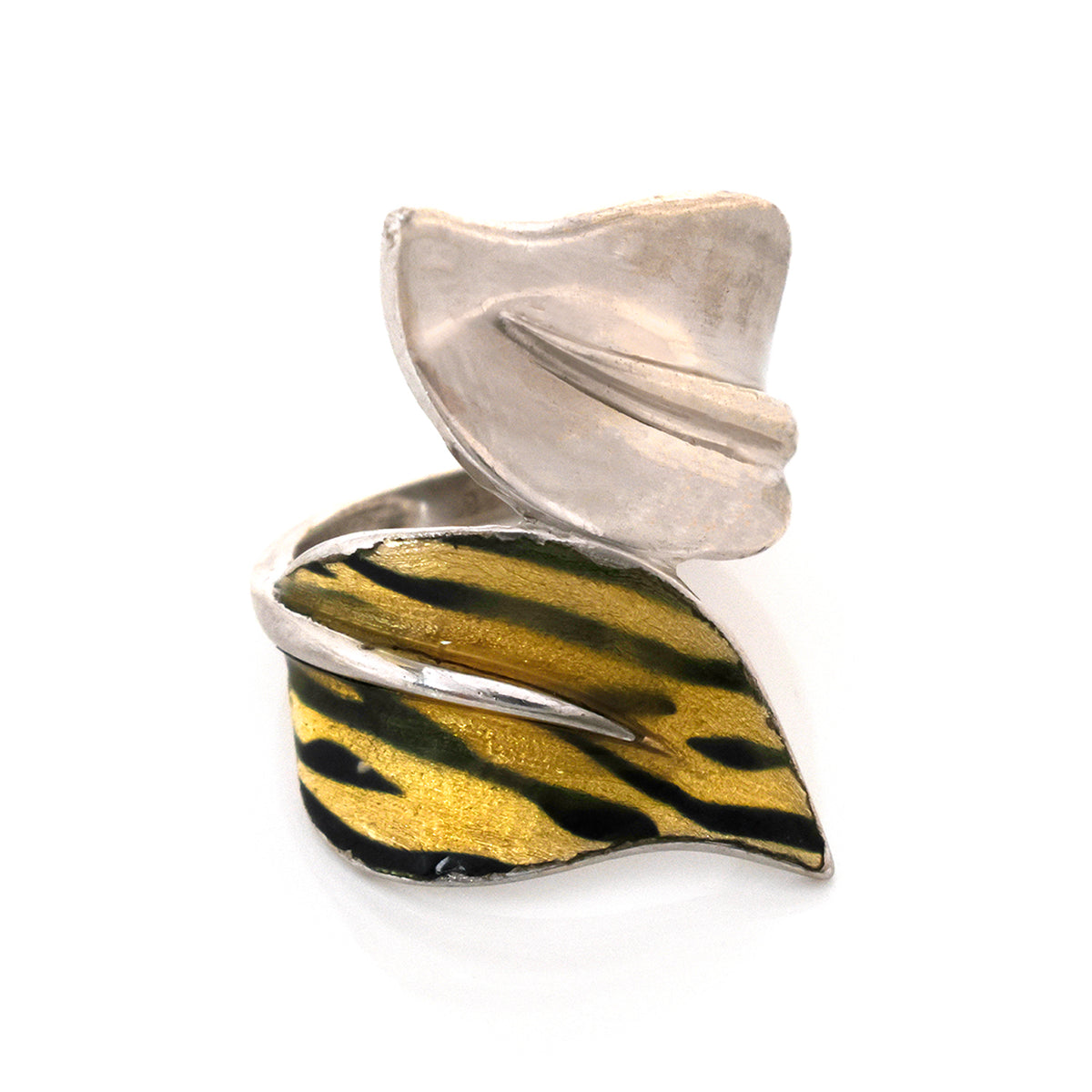 Silver and gold leaf-shaped pendant on a white background