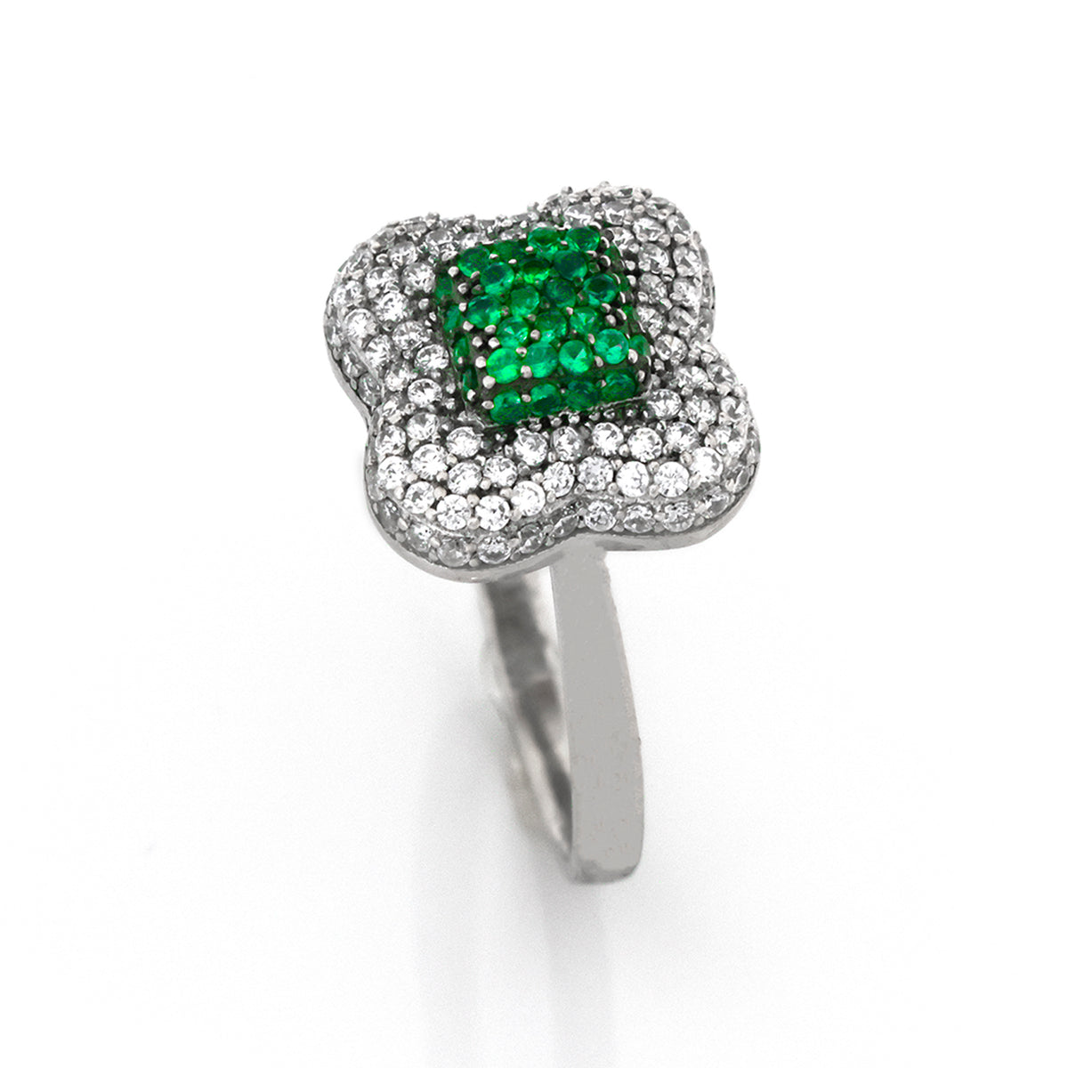 Silver ring with a green gemstone and diamond accents on a white background