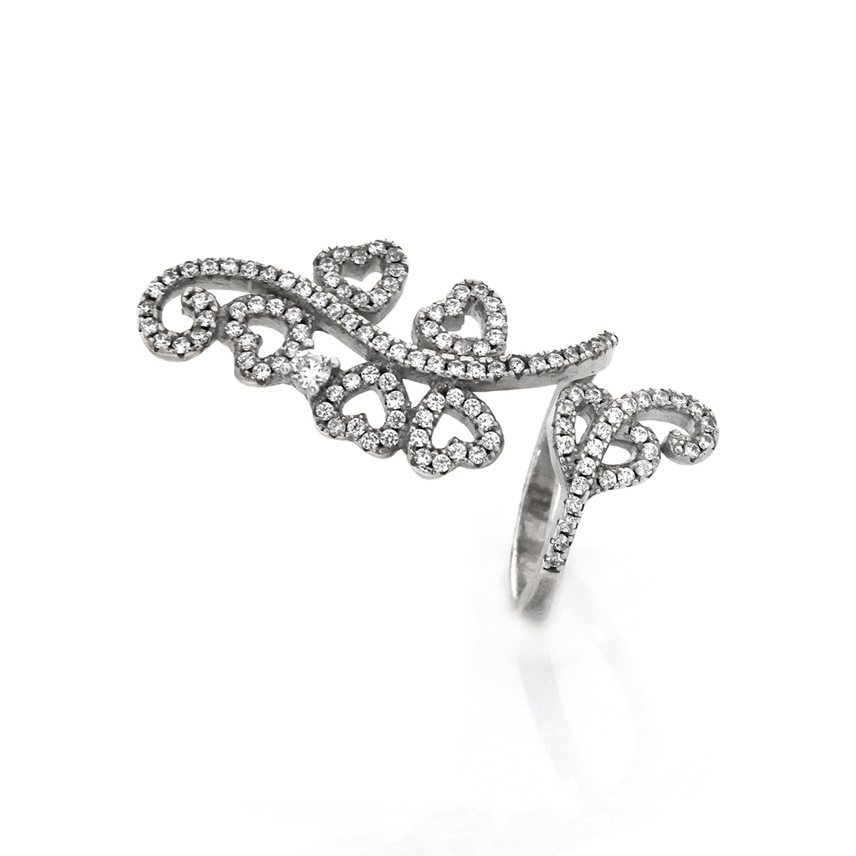Silver ring with intricate design on a white background