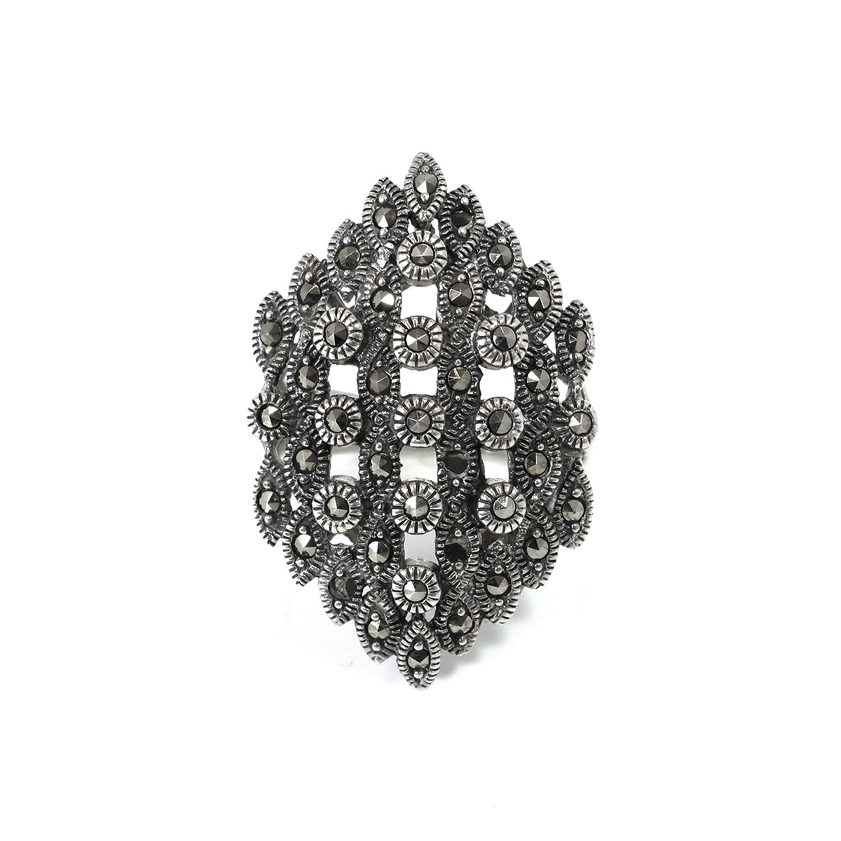 Decorative brooch with intricate design on a white background