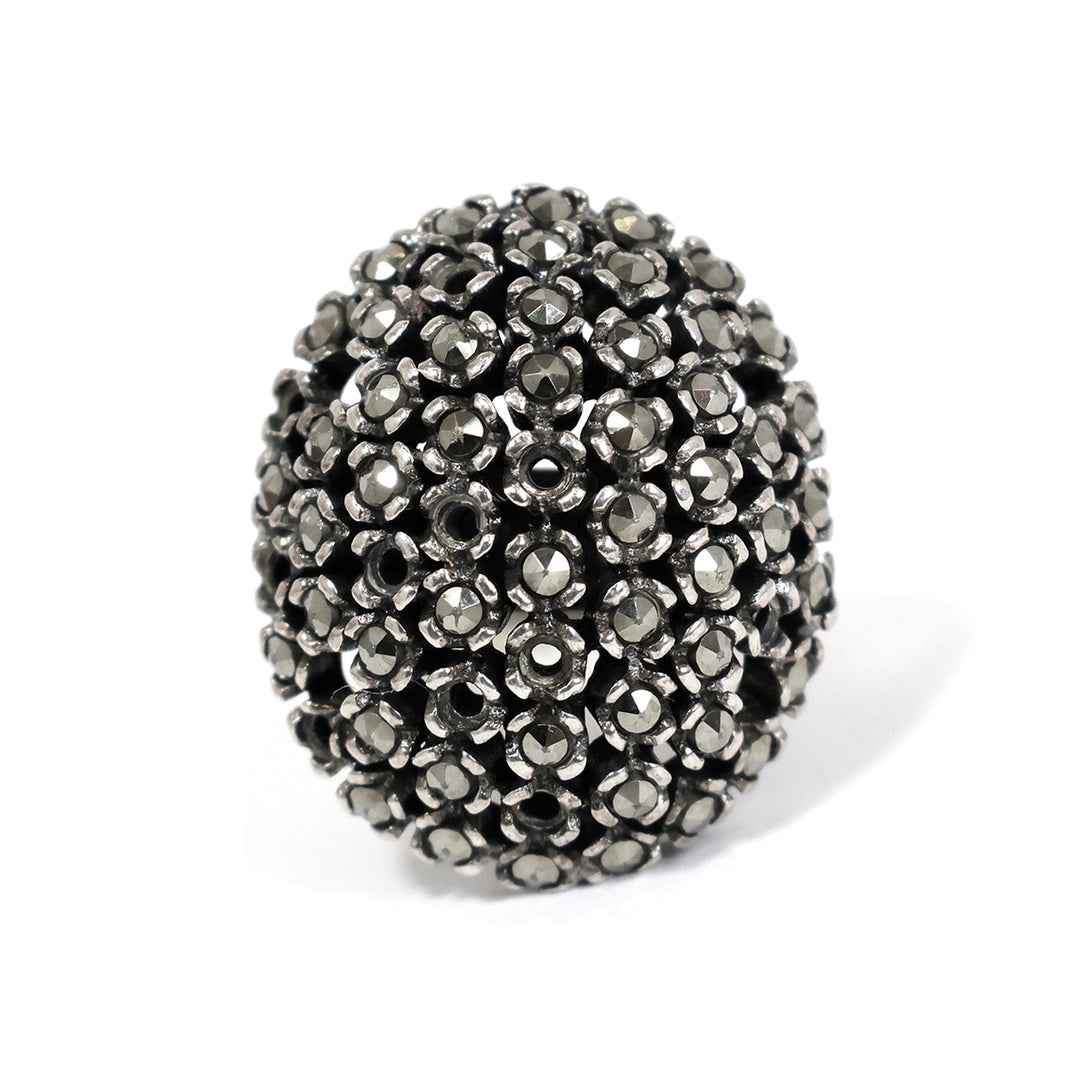 Black beaded خاتم on white background