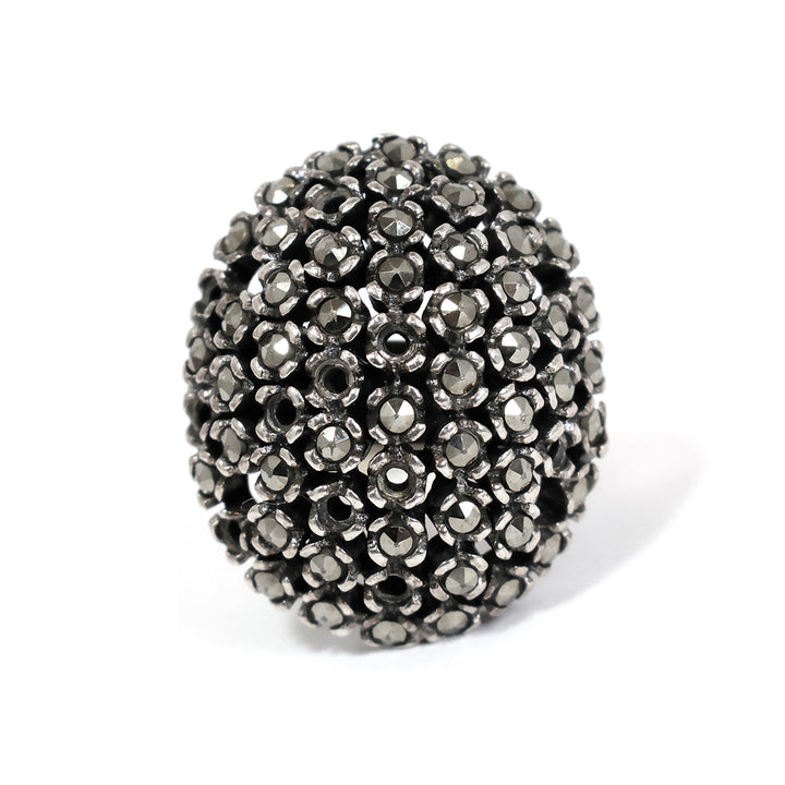 Black beaded خاتم on white background