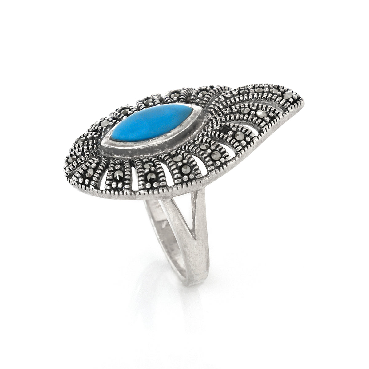 Silver ring with a blue stone on a white background