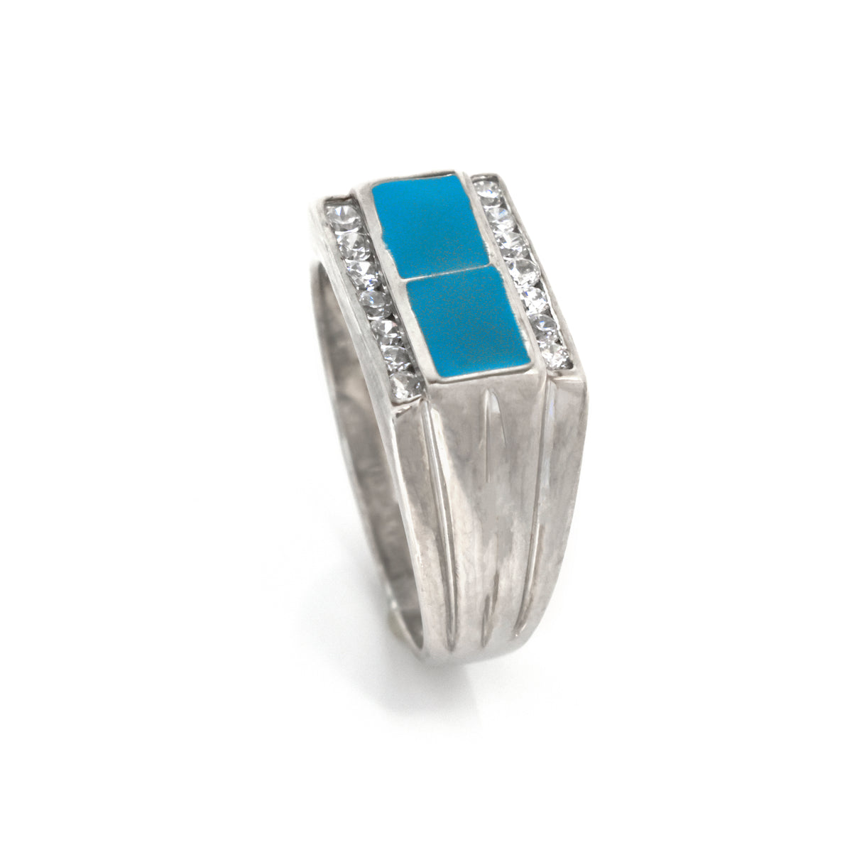 Silver ring with blue stones and clear gemstones on a white background