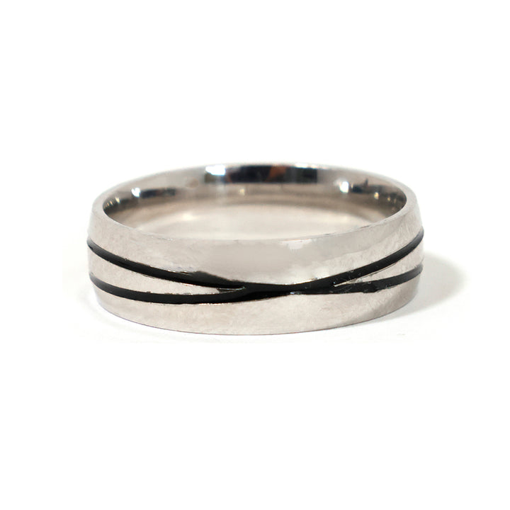 Silver ring with black inlay on a white background